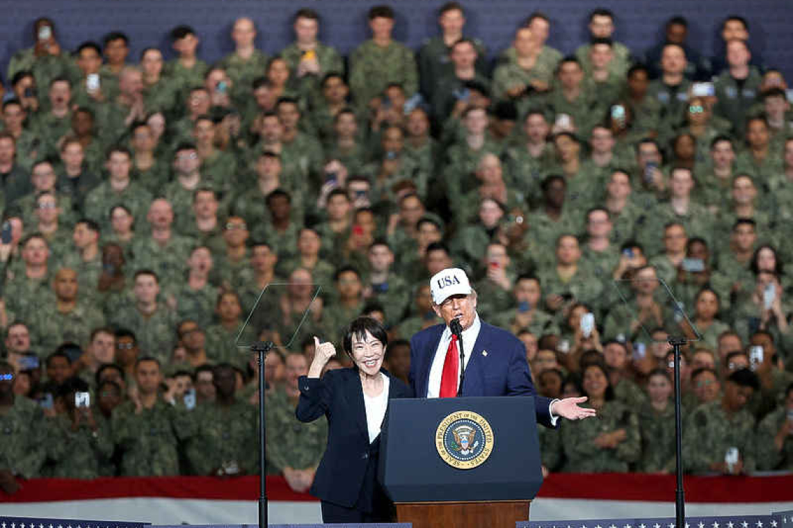 Trump heaps praise on Japan's first  female leader, signs rare earths deal